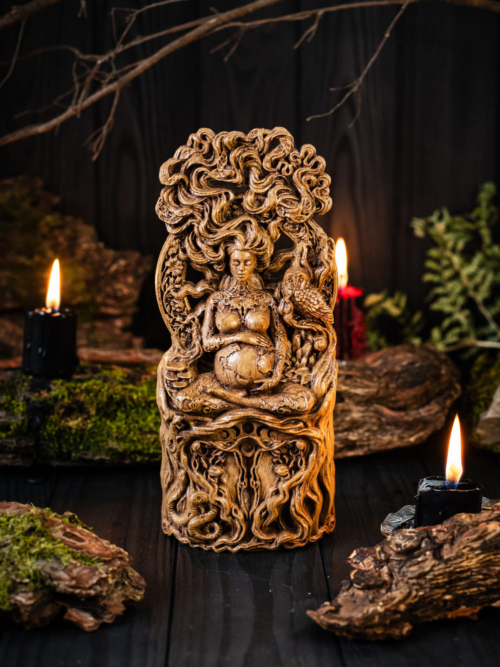 Full view of the Gaia statue from the front, highlighting its dimensions and intricate design, featuring a woman's womb and uterus symbolizing creation and fertility.