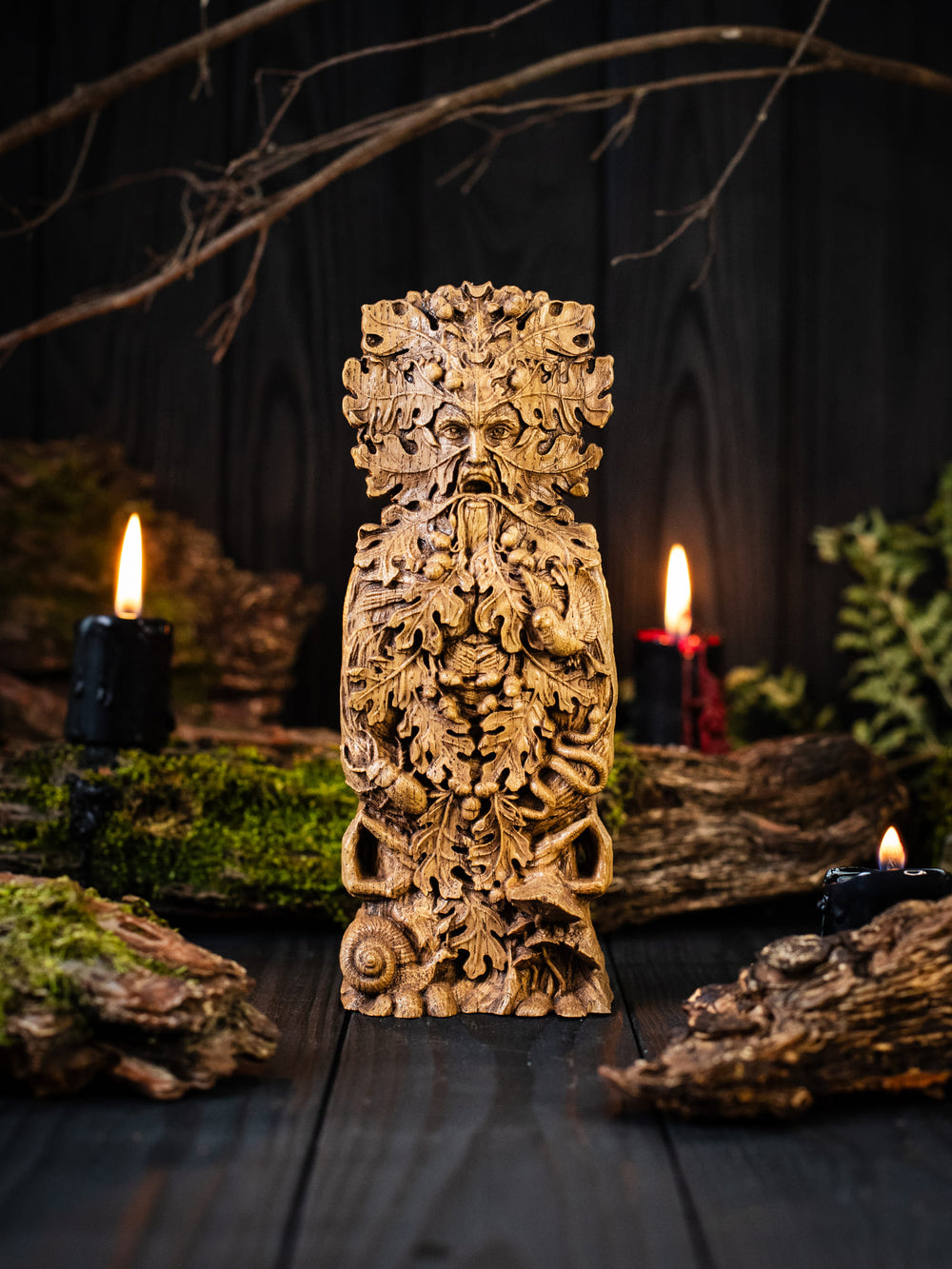 Full view of the Green Man bust from the front, highlighting its dimensions and intricate design with birds, insects, reptiles, and mushrooms symbolizing the interconnectedness of life.