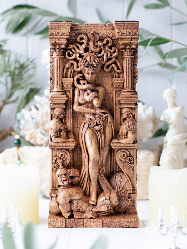 Full view of the Medusa statue from the front, highlighting its dimensions and intricate design with the petrified warrior beneath her.