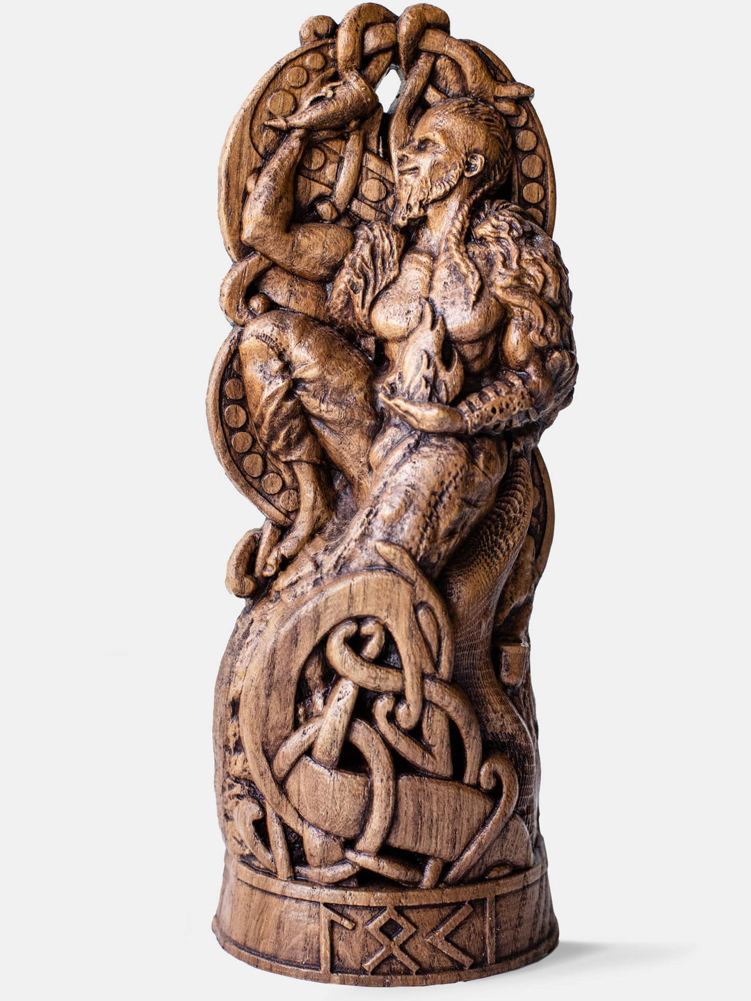 Close-up of the handcrafted oak Loki statue, showcasing the god of fire and trickery in a fun, playful pose.