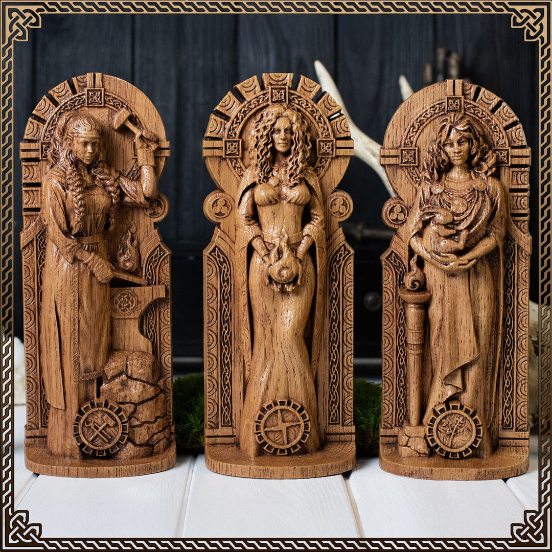Brigid goddess statue depicting the Celtic fire goddess in triple form with sacred symbols and wooden altar background