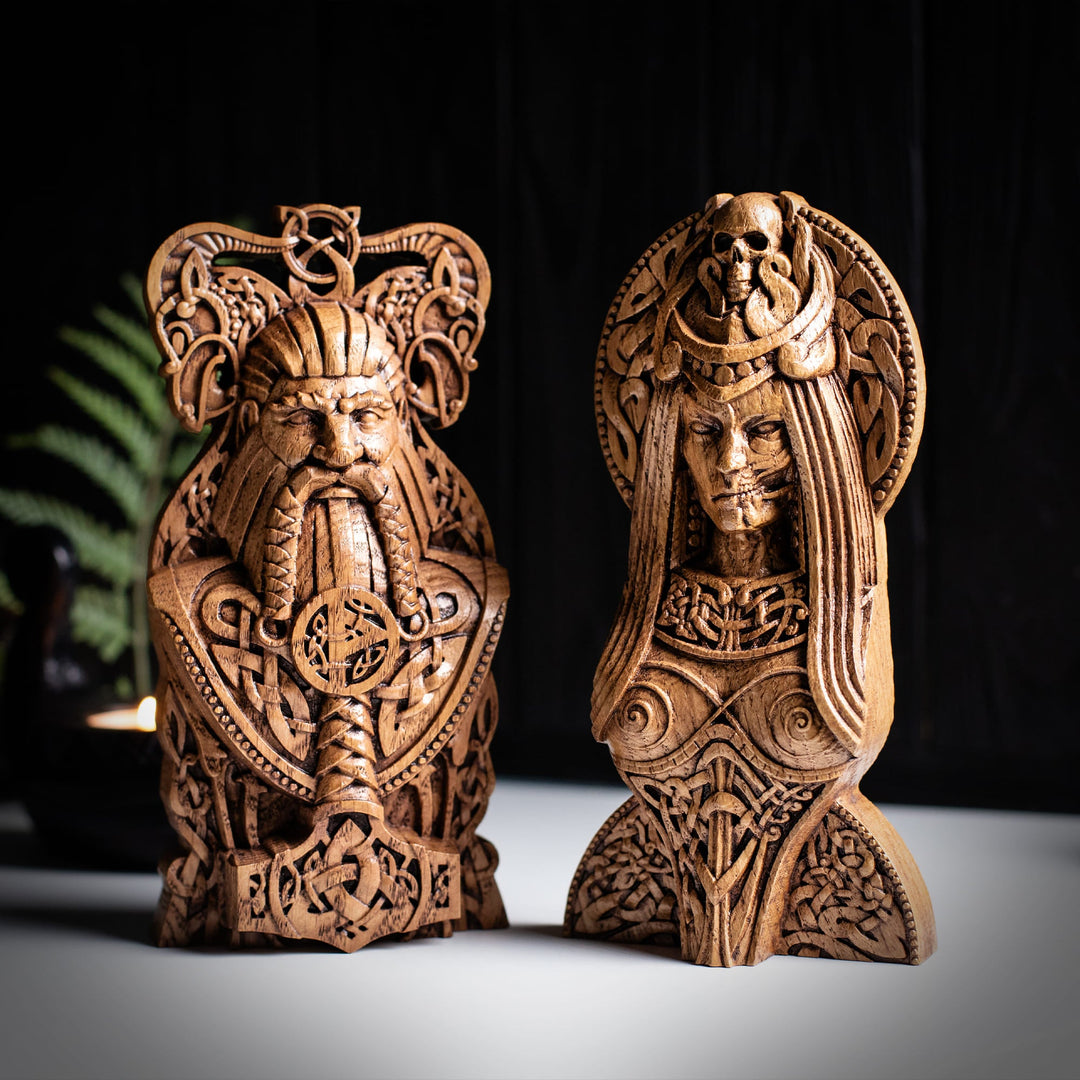 Hand-carved wooden bust statues with detailed mythological designs for altar and sacred decor