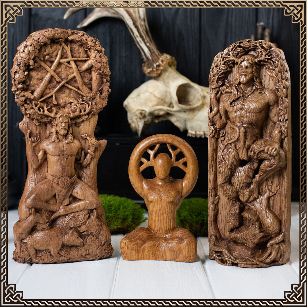 Cernunnos god statue depicting the horned god of Wicca and pagan horned god symbolism, handcrafted oak figures representing the Cernunnos Celtic god in ritual form.