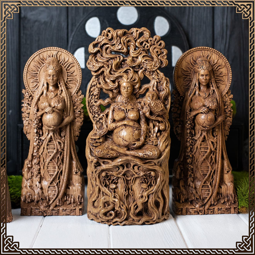Gaia the goddess of the earth depicted in oak statues — gaia earth goddess with flora, fauna, and planetary symbolism for pagan rituals and altars.
