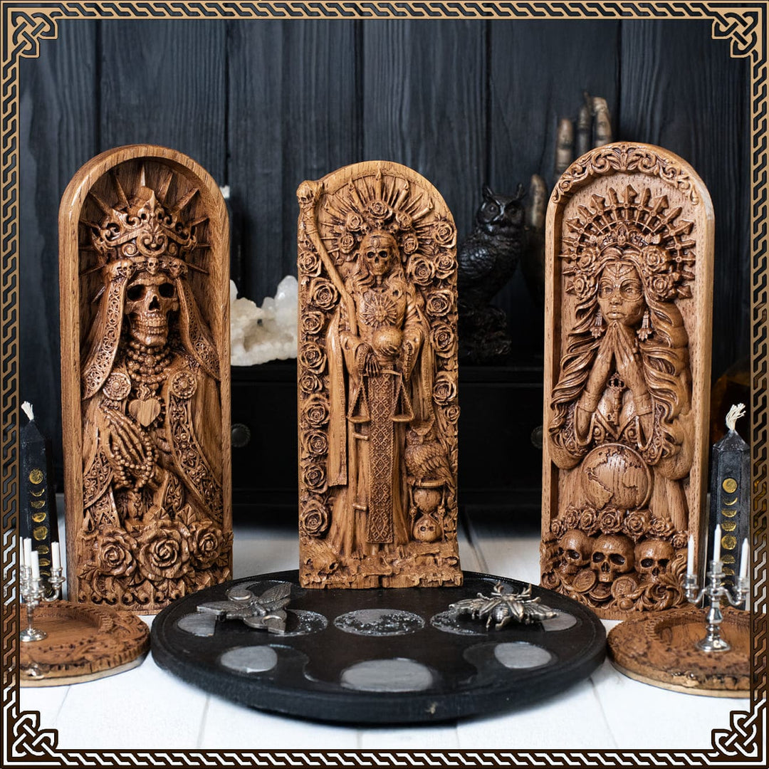 La Santa Muerte statue collection with wooden figurines for Santa Muerte altar, showcasing large carved representations of the Santa Muerte goddess