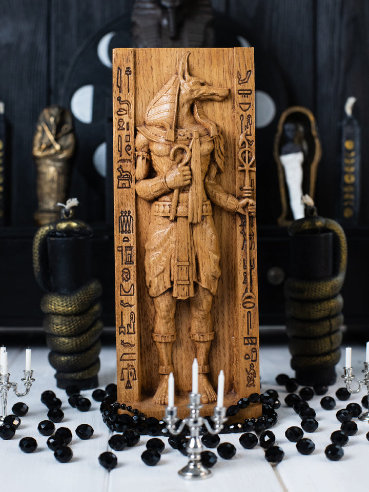 Full view of the Anubis statue from the front, highlighting its dimensions and intricate design against a plain background.