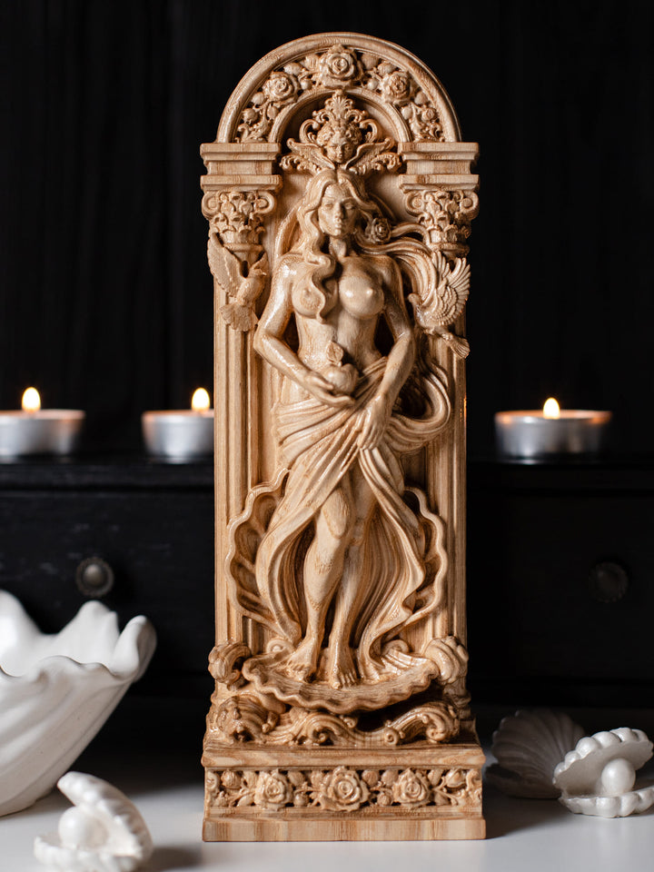 Hand-carved Aphrodite statue in natural ash wood featuring sea foam, doves and floral Greek goddess symbolism