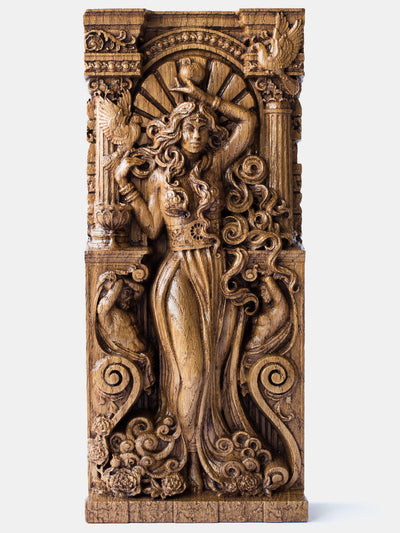 Close-up of the handcrafted oak Aphrodite statue, showcasing detailed carvings, including an apple and sea foam.