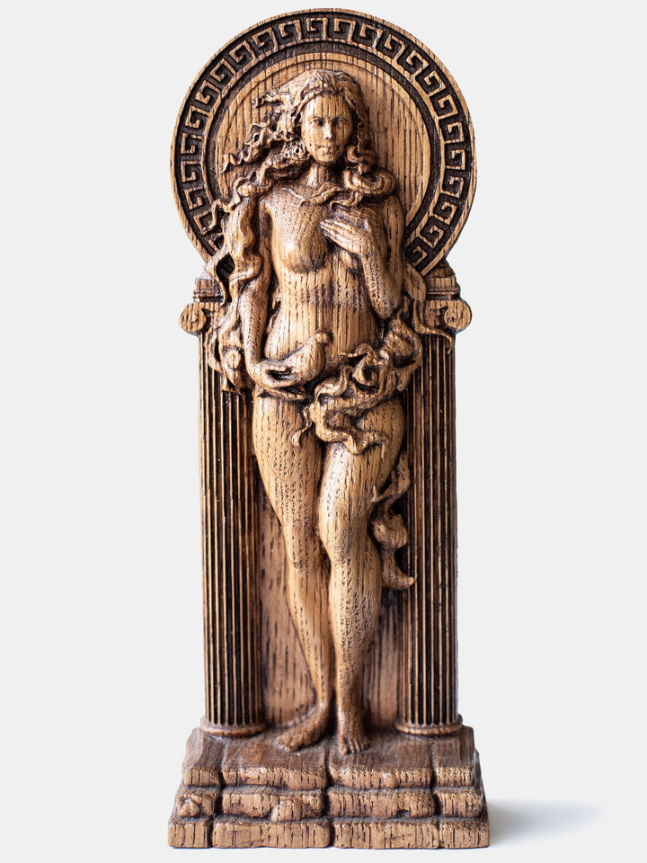 Close-up of the handcrafted oak Aphrodite statue, showcasing detailed carvings and oak wood grain.