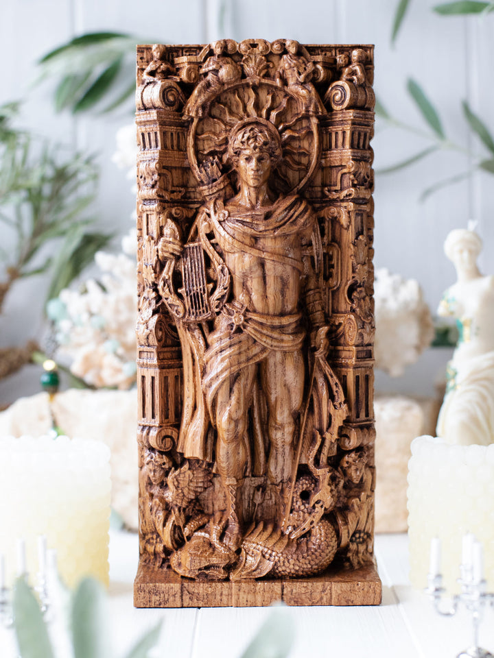 Full view of the Apollo statue from the front, highlighting its dimensions and intricate design, including a quiver of arrows and the sun.