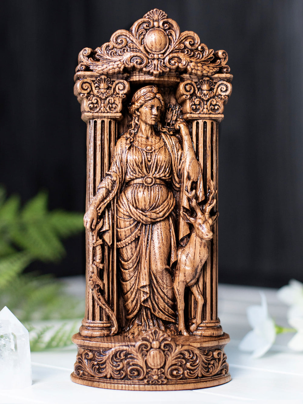 Wooden Greek goddess Diana figurine with young deer behind her, inspired by Greek statue and Artemis altar design