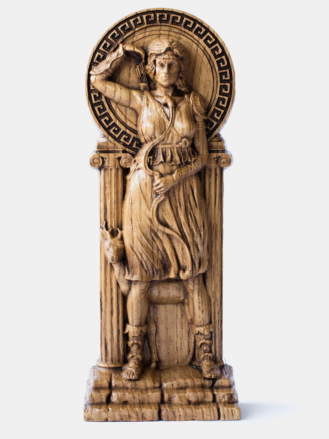 Close-up of the handcrafted oak Artemis statue, showcasing detailed carvings, including a bow and quiver of arrows.