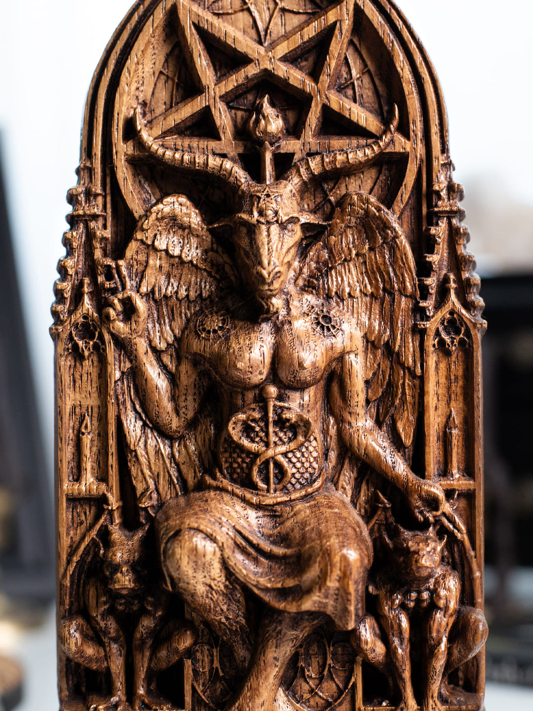 Figurine of Baphomet Deity - Symbol of Balance with Gothic Architecture