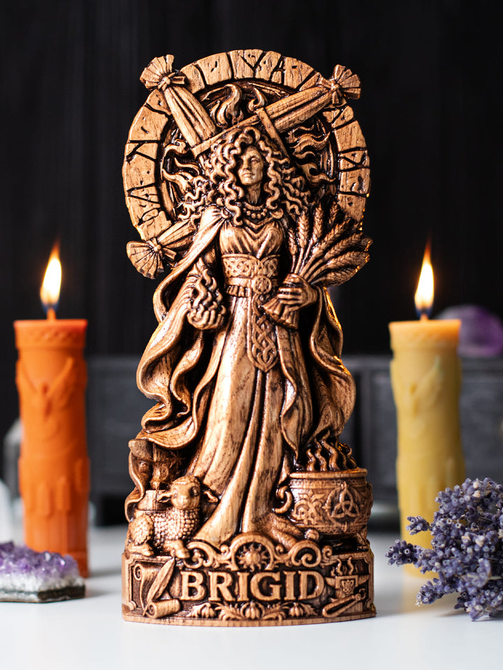 Handcrafted Brigid statue featuring Celtic goddess symbolism for Wiccan altar, pagan decor and spiritual spaces.