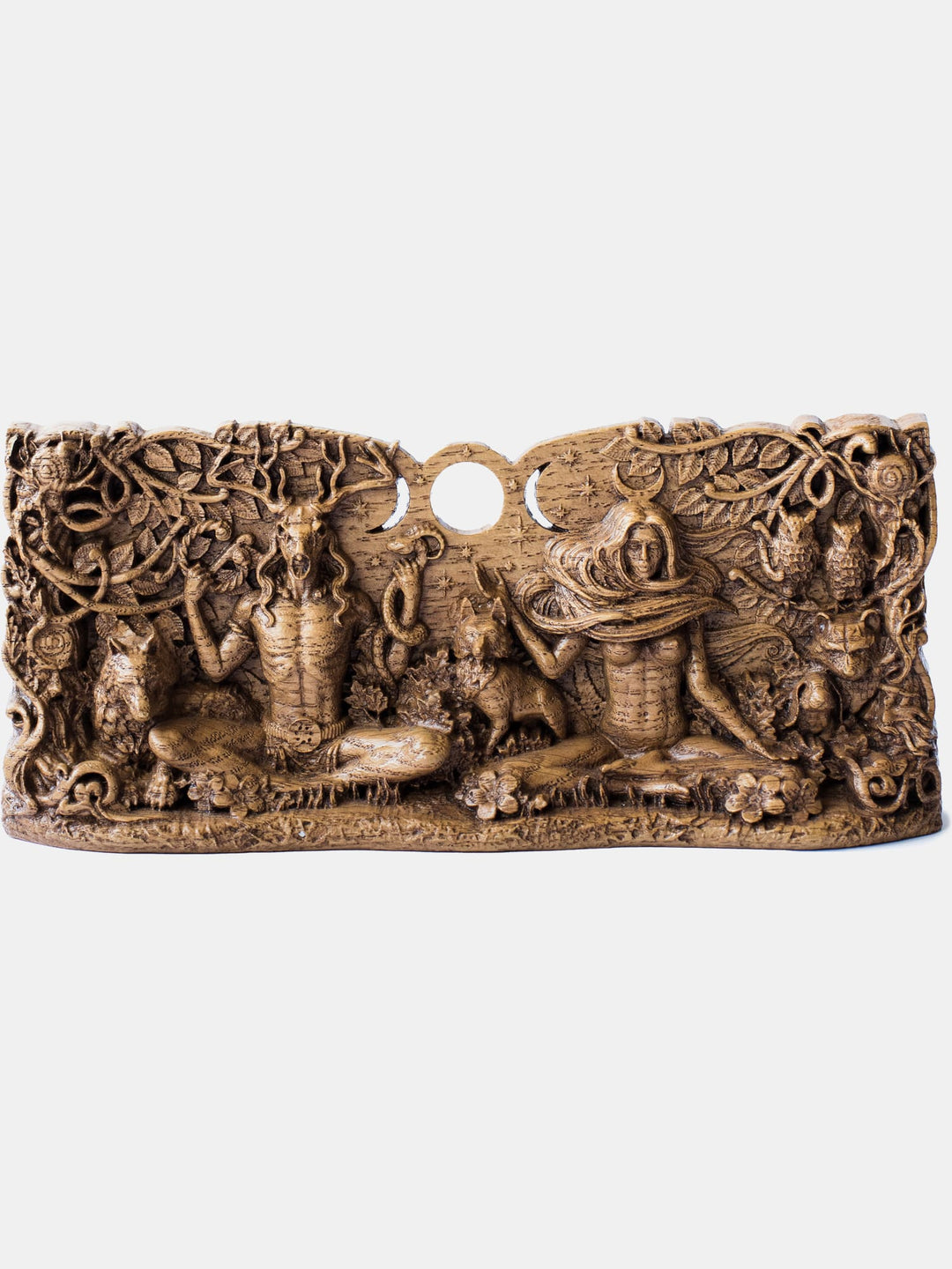 lose-up of the handcrafted oak Cernunnos and Moon Goddess statue, showcasing detailed carvings of them seated in lotus positions with a snake in Cernunnos' hands.