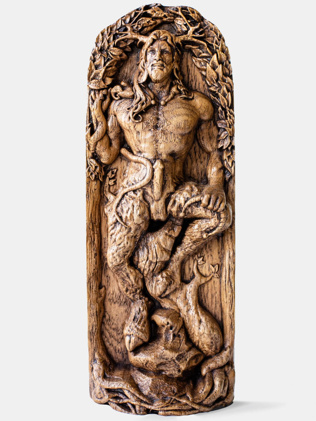 Close-up of the handcrafted oak Cernunnos statue, showcasing detailed carvings of Cernunnos with goat legs holding a snake and a torc.