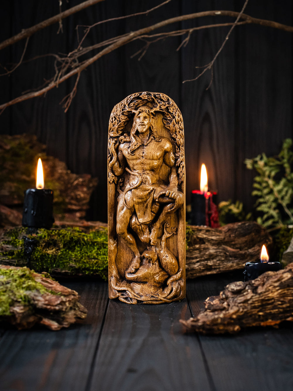 Full view of the Cernunnos statue from the front, highlighting its dimensions and intricate design, featuring trees.