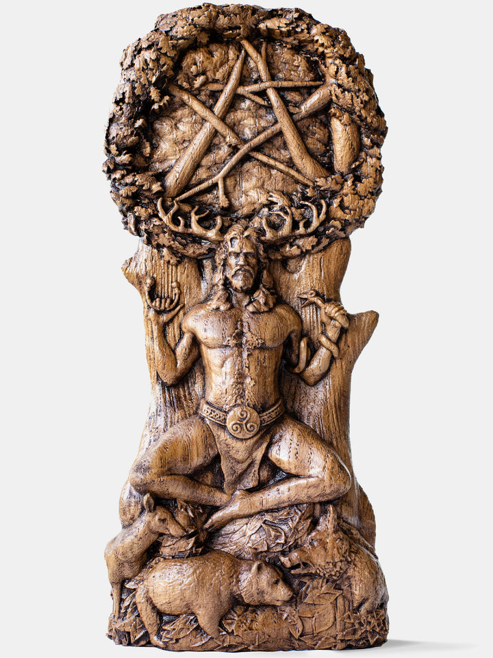 Close-up of the handcrafted oak Cernunnos statue, showcasing detailed carvings of Cernunnos holding a snake and a torque.