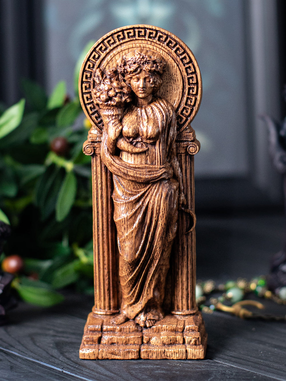 Full view of the Demeter statue from the front, highlighting its dimensions and intricate design against a plain background.
