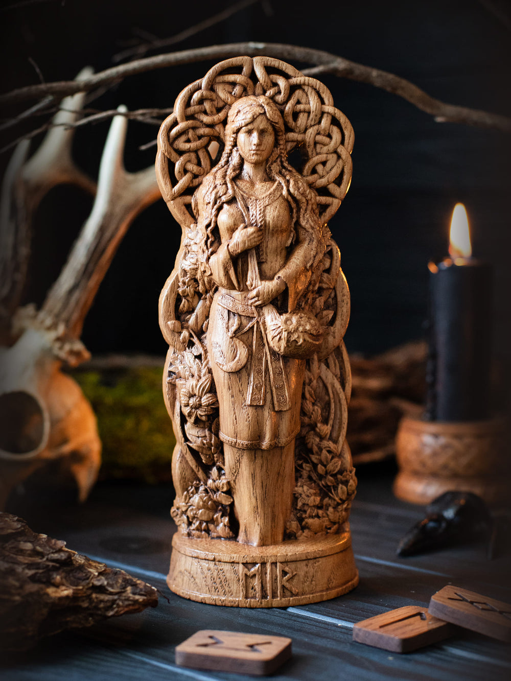 Full view of the Eir statue from the front, highlighting its dimensions and intricate design against a plain background.
