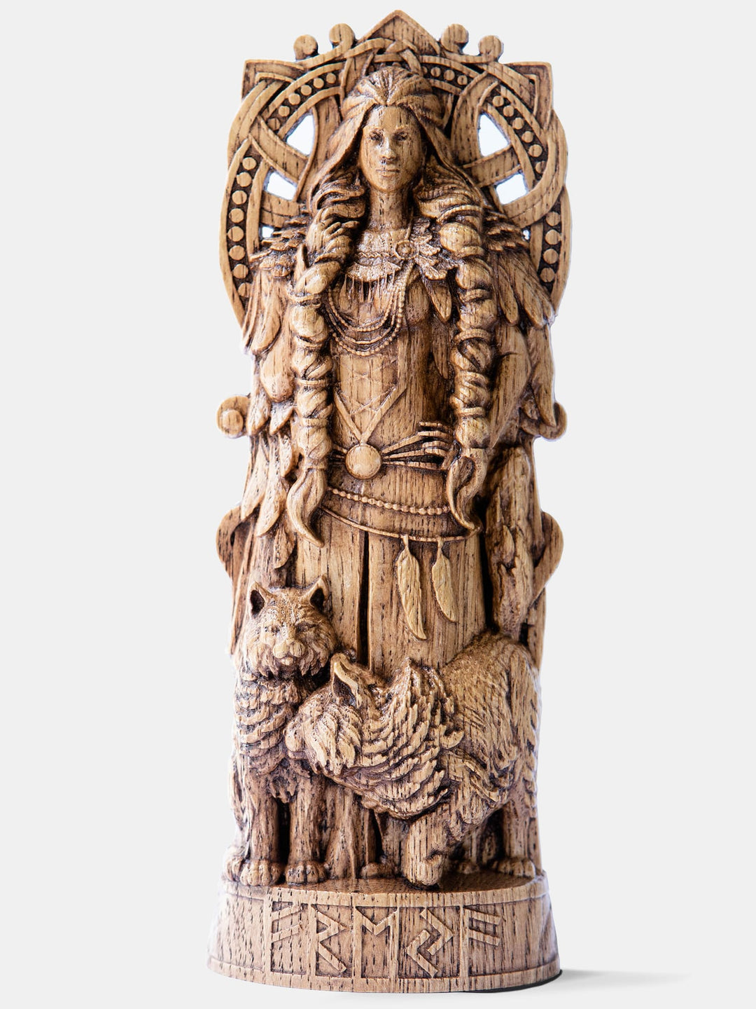 Close-up of the handcrafted oak Freya statue, showcasing detailed carvings of Freya with her necklace, Brísingamen.