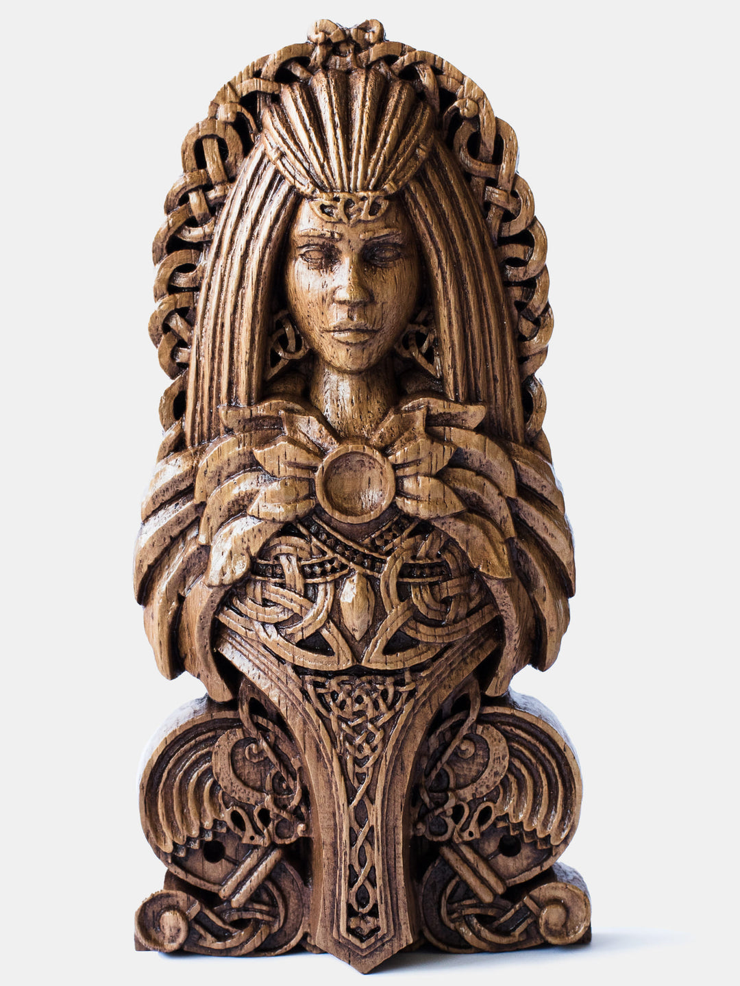 Close-up of the handcrafted oak Freya bust, showcasing detailed Scandinavian carvings and Freya’s attributes: necklace, cats, and feather cloak.