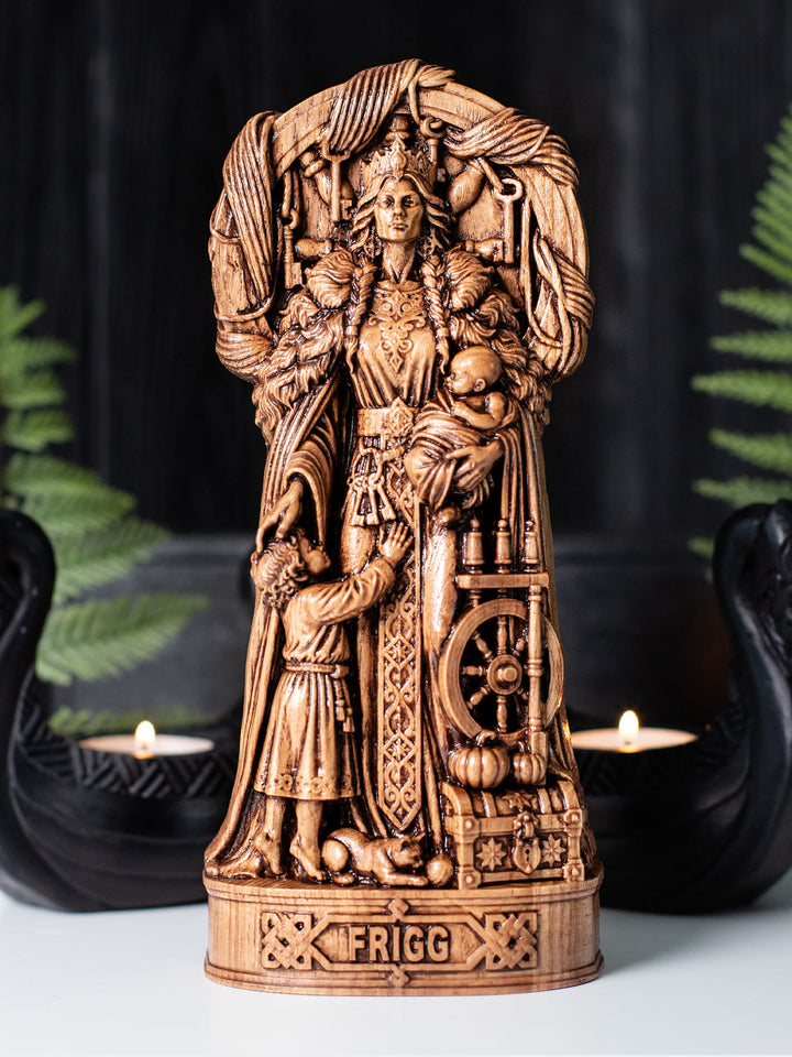 Handmade oak wood Frigg statue with antique finish inspired by Norse mythology and Scandinavian folk art.