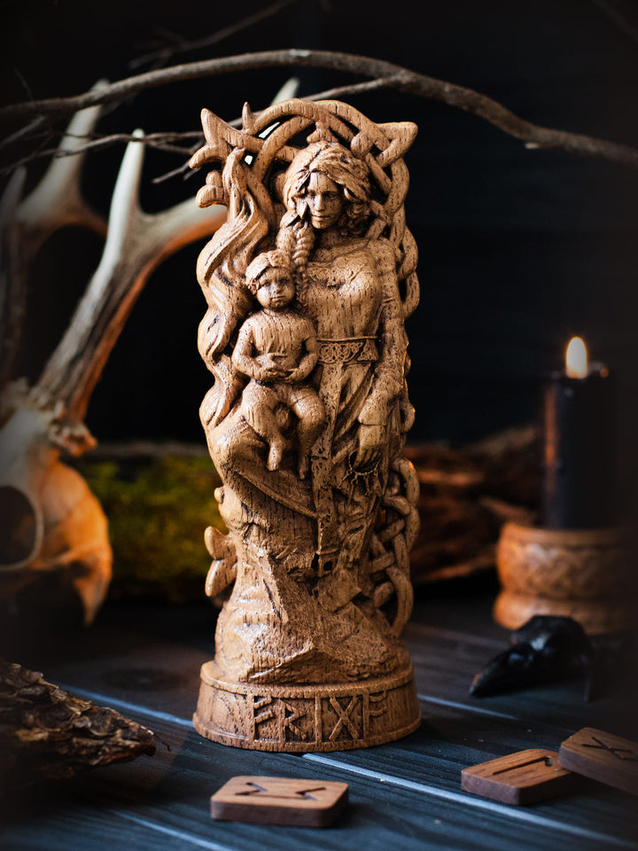 Full view of the Frigg statue from the front, highlighting its dimensions and intricate design against a plain background.