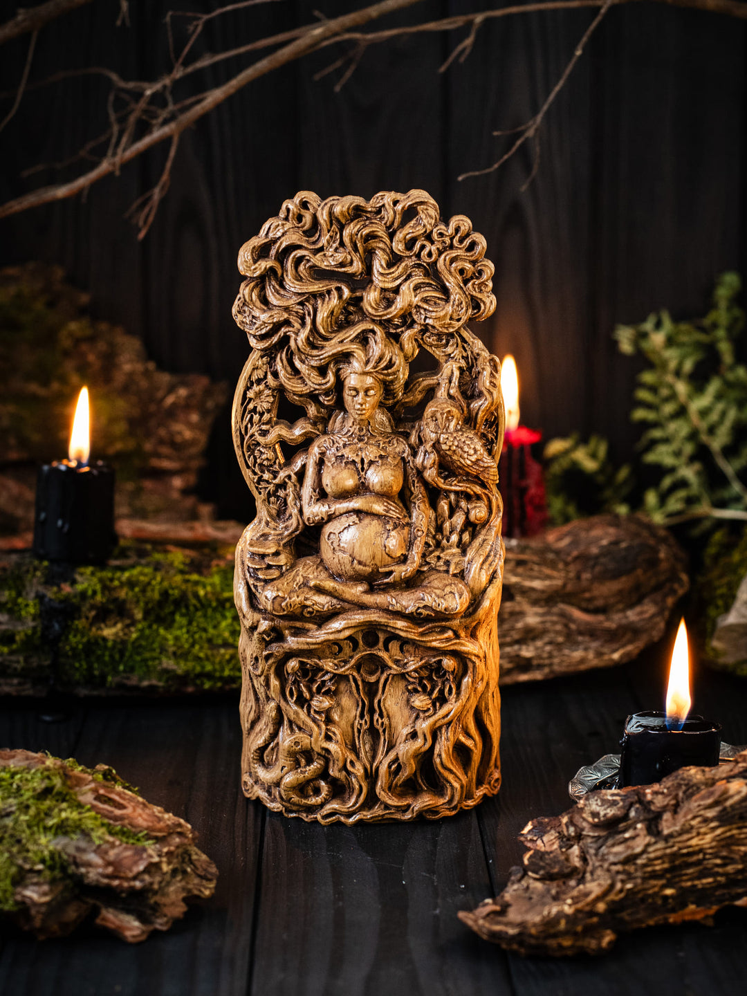 Full view of the Gaia statue from the front, highlighting its dimensions and intricate design, featuring a woman's womb and uterus symbolizing creation and fertility.