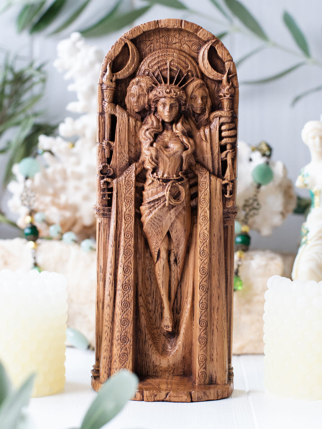 Full view of the Hecate statue from the front, highlighting its dimensions and intricate design with key attributes and a seven-pointed crown.