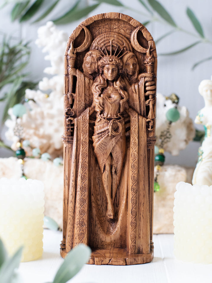 Full view of the Hecate statue from the front, highlighting its dimensions and intricate design with key attributes and a seven-pointed crown.