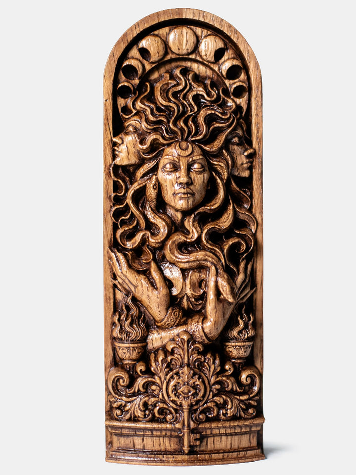 Hand carved Hekate triple goddess wooden bust with moon phases, torches, and key for witch altar decor.