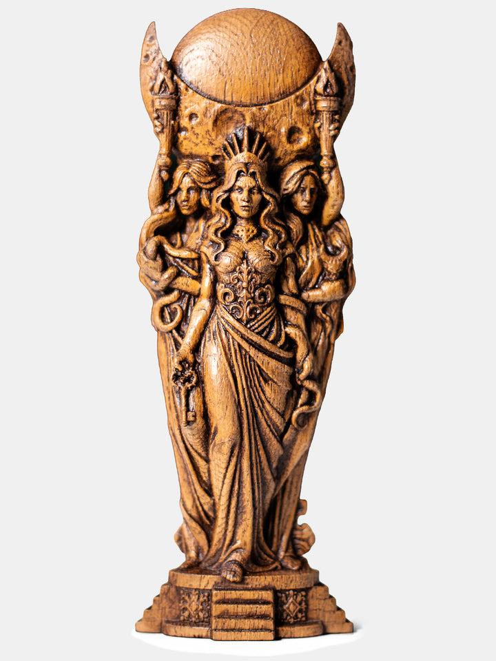 Handcrafted hecate statue showing the triple goddess with hecate key, moon phases and crossroads symbolism