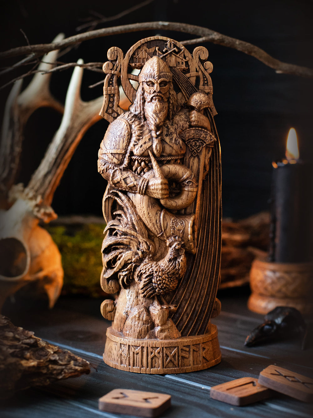 Full view of the Heimdall statue from the front, highlighting its dimensions and intricate design with a rooster at his feet symbolizing vigilance.