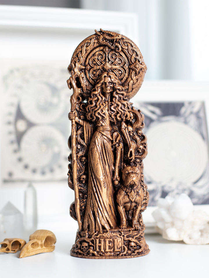 Handmade oak wood Hel statue with antique patina inspired by Norse mythology and Scandinavian folk art.