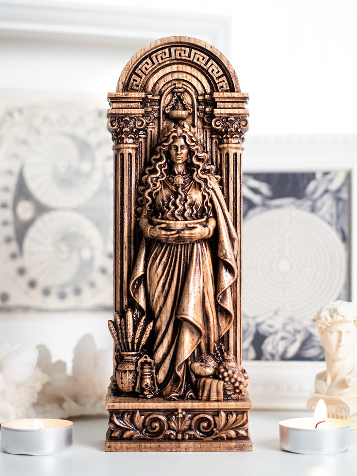 Handmade oak wood Hestia statue with antique patina for pagan decor, home altar, and sacred hearth symbolism.