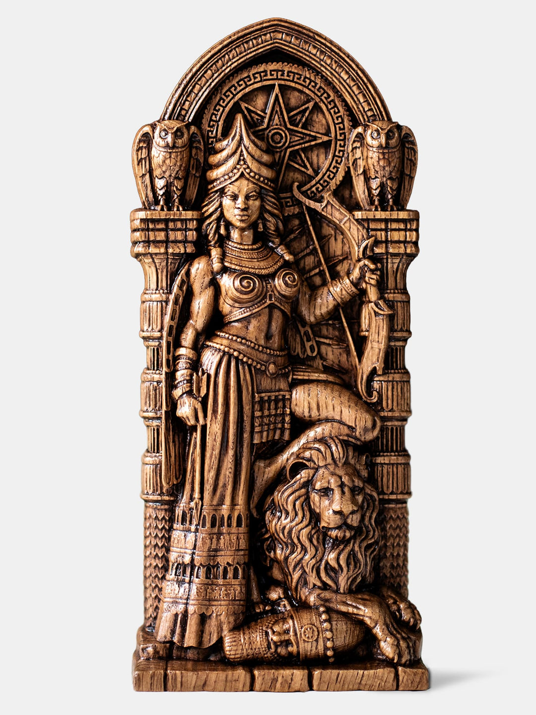 lt Text 1:
"Handcrafted Ishtar statue in warrior aspect holding bow and arrow, standing on lion and fallen enemy with star of Ishtar behind.