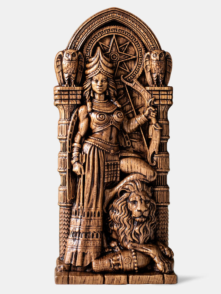 lt Text 1:
"Handcrafted Ishtar statue in warrior aspect holding bow and arrow, standing on lion and fallen enemy with star of Ishtar behind.