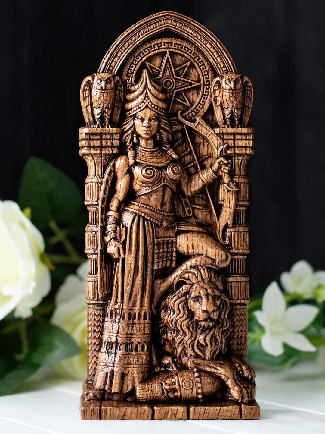 Wooden Inanna statue with wings, horned crown, owls, Sumerian columns, and celestial star of Ishtar backdrop.