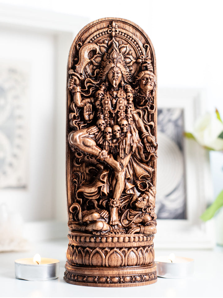 Kali goddess wooden statue for Shakti altar, yoga studio decor, meditation space, and spiritual shelf styling.