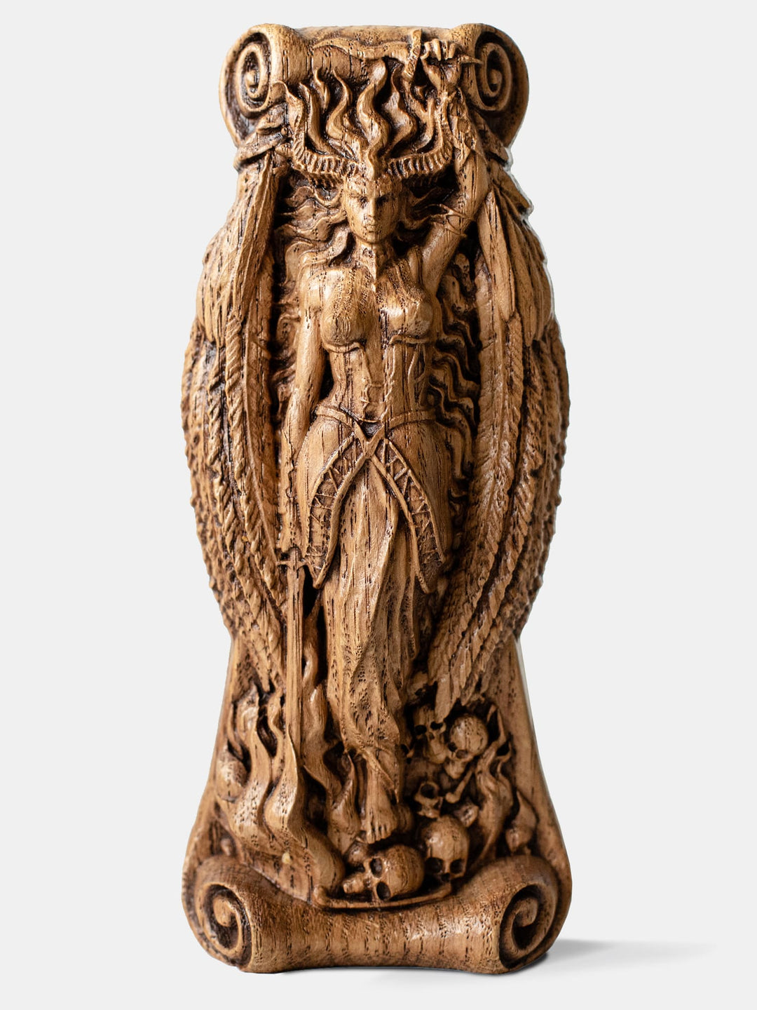 Close-up of the handcrafted oak Lilith statue, showcasing the goddess with a dagger above her head, a sword pointing down, and flaming hair.