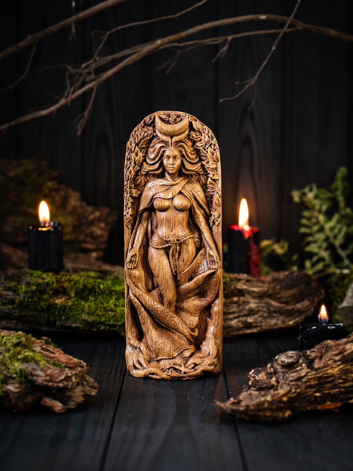 Full view of the Moon Goddess statue from the front, highlighting its dimensions and intricate design with her palms turned towards us.