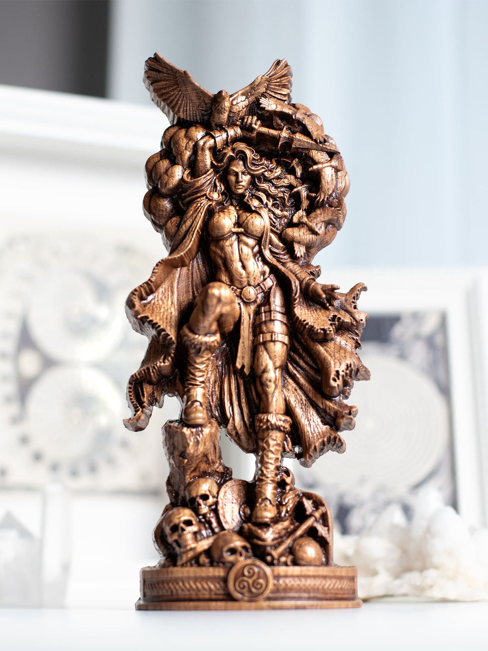 Wooden Morrigan wall hanging sculpture with raven goddess symbolism, triskele ornament and Tuatha Dé Danann heritage.