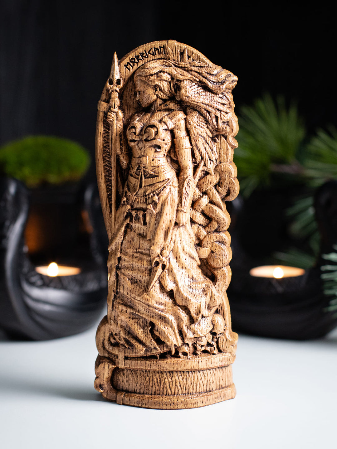 Goddess Morrigan. Wooden statue of Celtic Goddess Morrigu