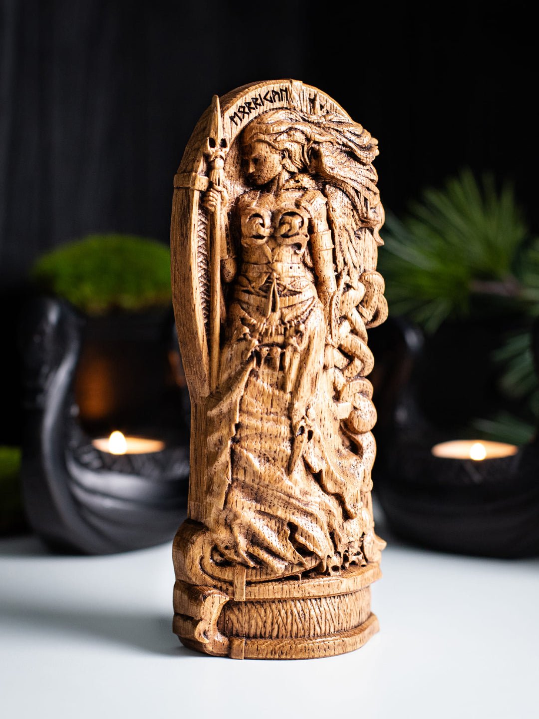 Goddess Morrigan. Wooden statue of Celtic Goddess Morrigu