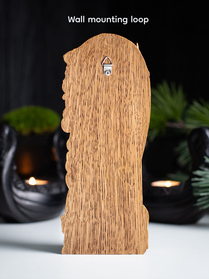 Goddess Morrigan. Wooden statue of Celtic Goddess Morrigu