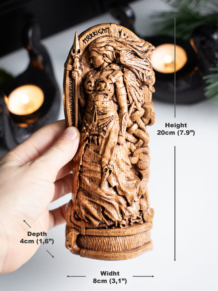 Goddess Morrigan. Wooden statue of Celtic Goddess Morrigu