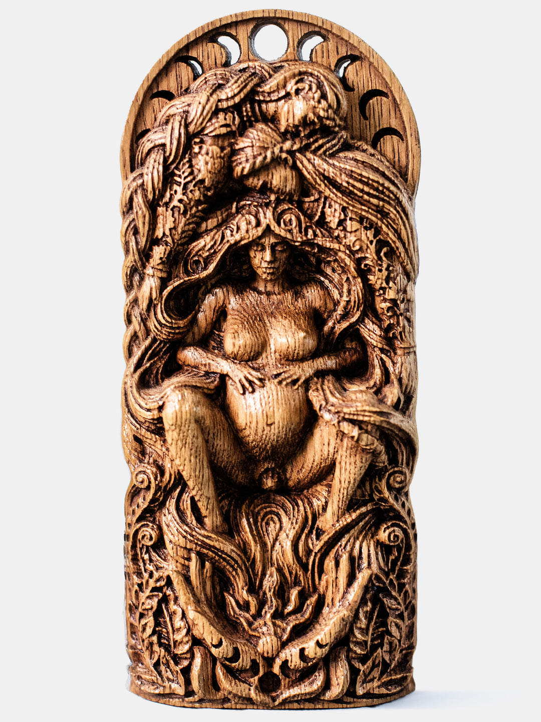 Full view of The Pregnant Goddess statue from the front, highlighting hands holding the sun, symbolizing midwives, doulas, and the natural world welcoming new life.