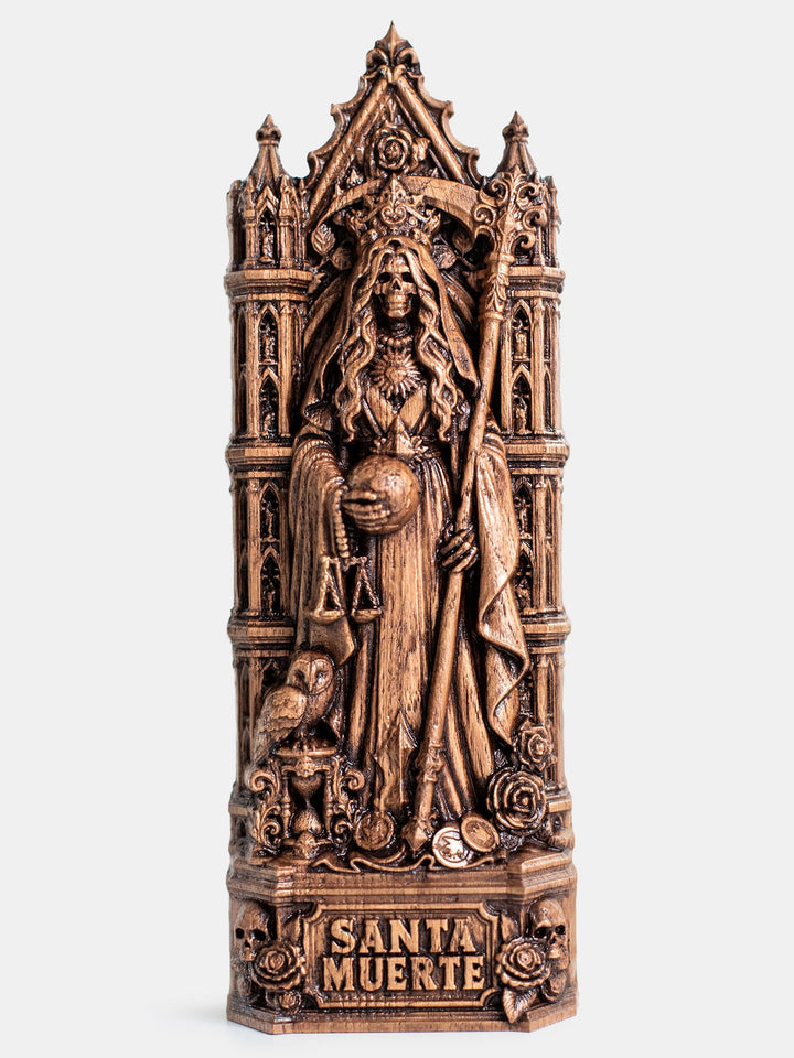 Hand carved Santa Muerte wooden statue for Holy Death altar, gothic decor, and memento mori collection.