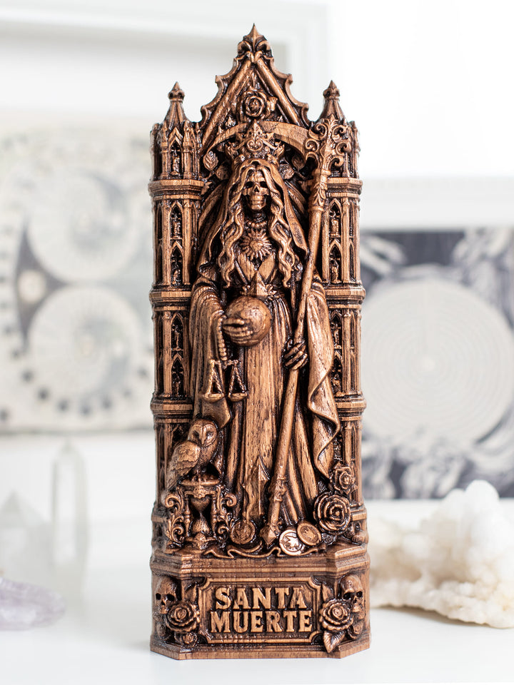 Handmade oak wood Santa Muerte statue with antique patina for witchy home decor, Día de los Muertos, and dark academia space.
